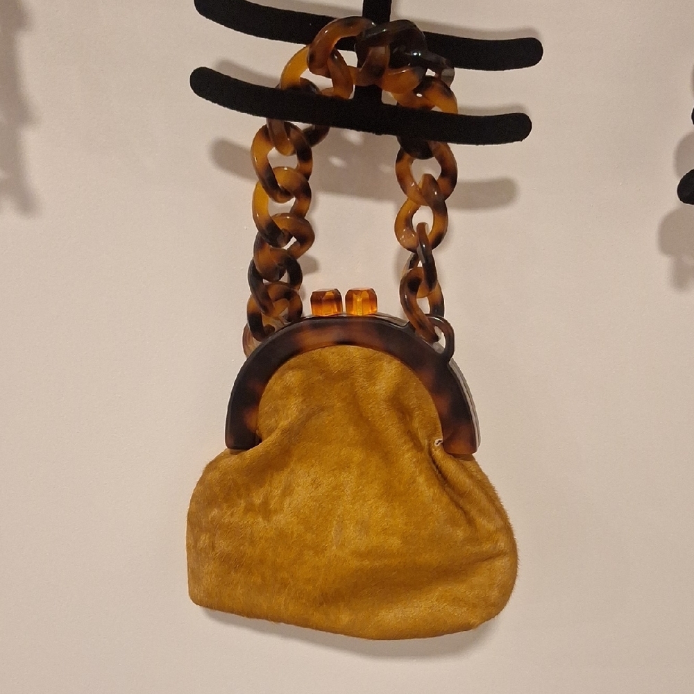 Elegant Tan Handbag with Chain Detail